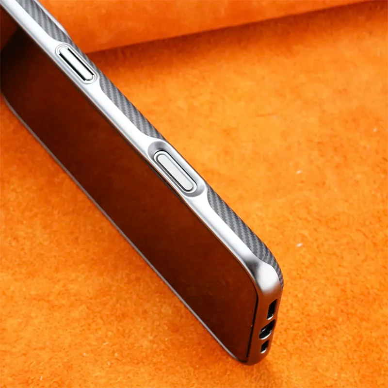 Stylish iPhone case with a lightweight and durable Kevlar pattern, showing side buttons and ports.